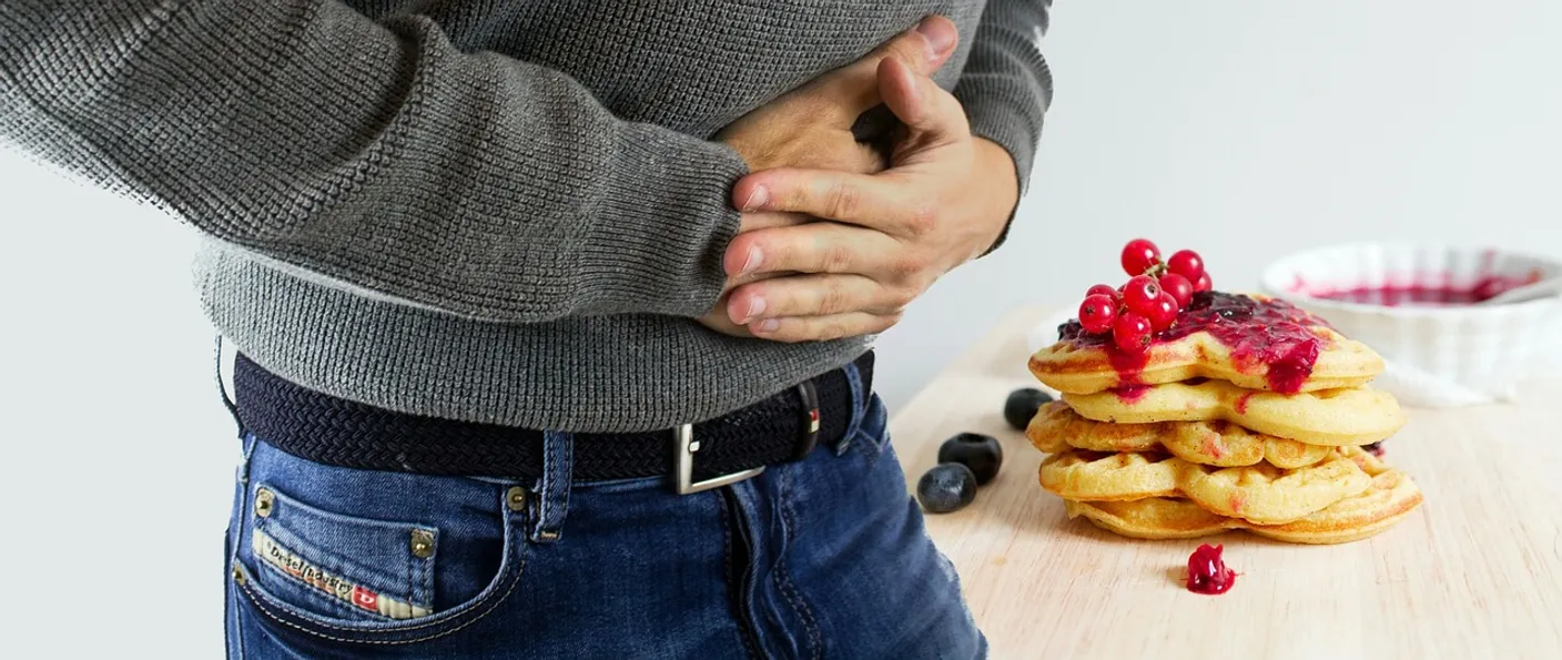 Cover for The Sugar You're Craving Is Feeding the Enemy Inside Your Gut
